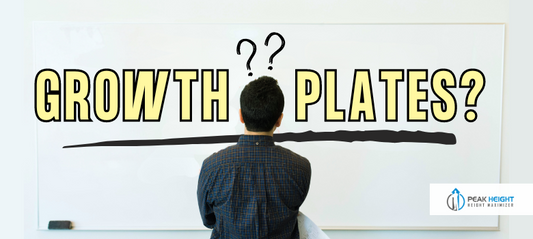 a man staring at a white board written "Growth Plates?"